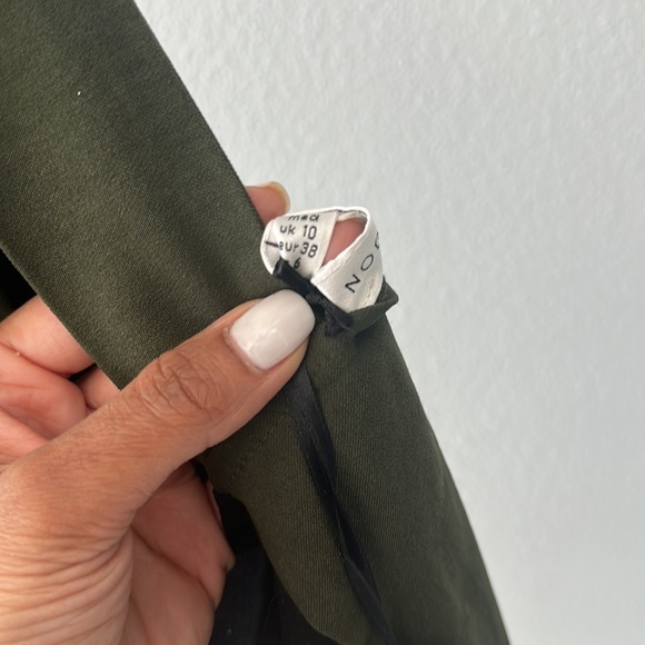 Rare London Green/Black Form Fitting Cross-Back Dress with Gold Buckle Details - Picture 9 of 10